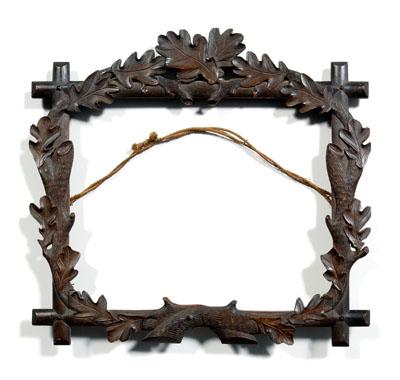 Folk art carved wood frame, carved