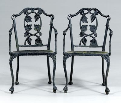 Pair cast iron garden armchairs: