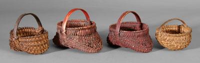 Four miniature egg baskets: two with