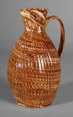 Agateware pitcher, ovoid with spiraled