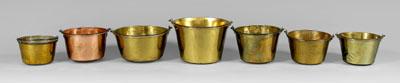 Seven brass and copper kettles  94eaf