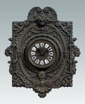 French brass wall clock, relief
