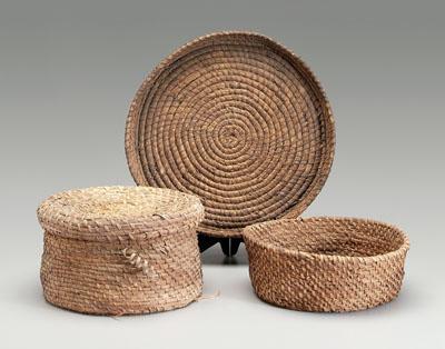 Three coiled straw baskets, coils