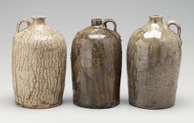 Three Georgia pottery jugs: one
