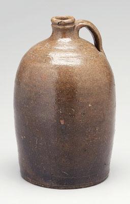 Lucius Jordan stoneware jug, strap