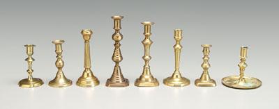 Eight assorted brass candlesticks  95237