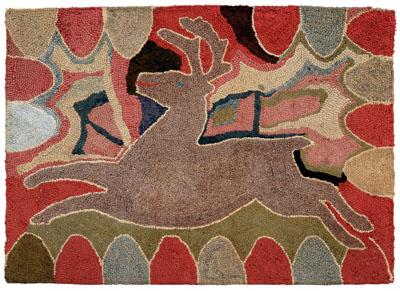 Hooked rug with reindeer running 94f31