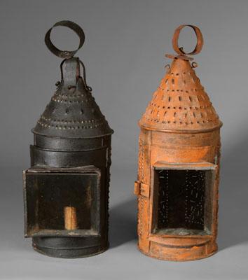 Two similar punched tin lanterns  94f47