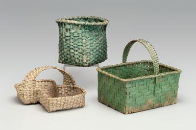 Three painted baskets: one rectangular