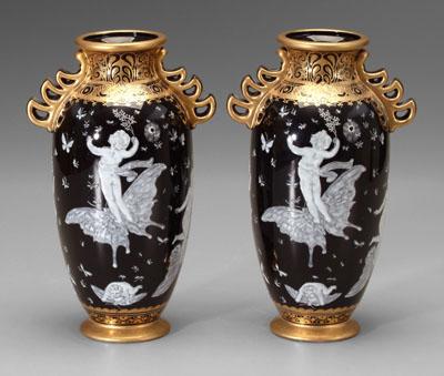Pair porcelain vases cherubs riding a0810