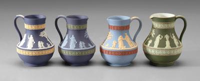 Four Wedgwood tri-color pitchers:
