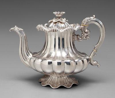 Silver-plated teapot, melon form, scroll
