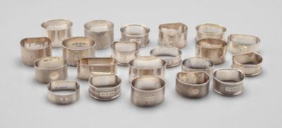 21 English silver napkin rings  a0911