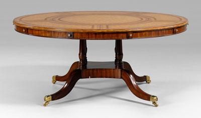 Regency style leather-top table, circular