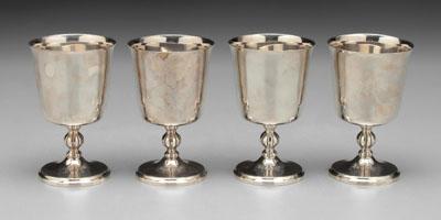 Set of four English silver goblets: