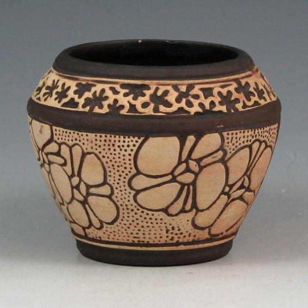 Weller Claywood vase with blossoms.