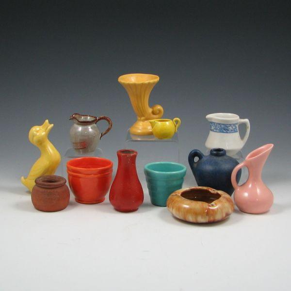 Eleven cabinet pieces of pottery b3f7a