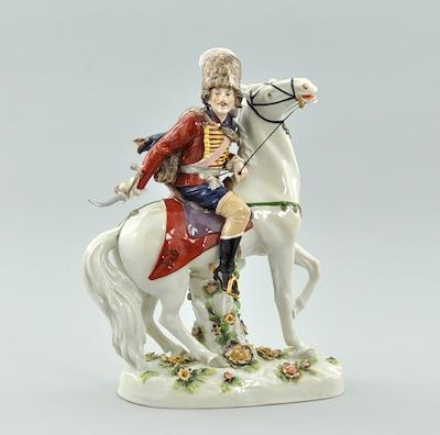 A Porcelain Horse-Mounted Hussar by