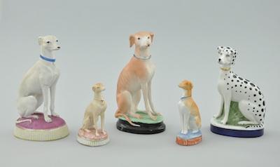A Collection of Porcelain Seated Dogs