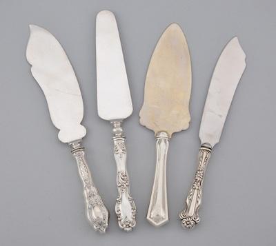 A Lot of Four Serving Knives Consisting