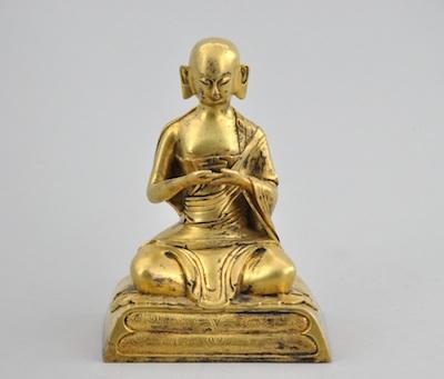A Gilt Bronze Figurine of a Seated b49b3