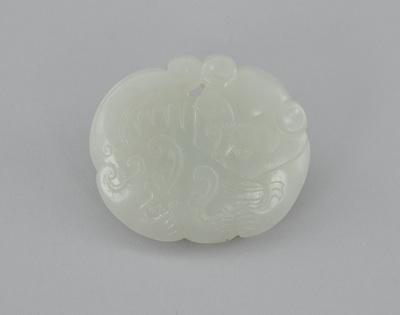 A Carved Jade Ornament Carved on both