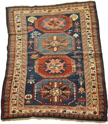 A Caucasian Area Rug Approx. 4'-10"