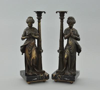 A Pair of Bronze Figurative Candlesticks  b46d0