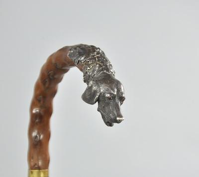 A Silver Dog Head Walking Stick