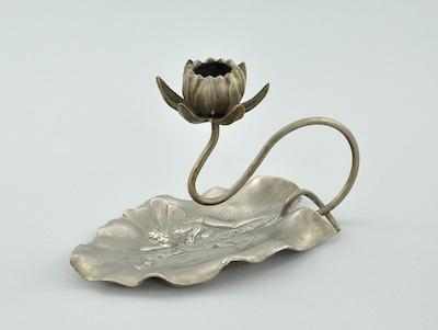 An Art Nouveau Style Candle Holder Cast