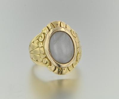 A Handcrafted Gold Ring with Grey