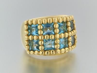 An 18k Gold and Aquamarine Ring b4773