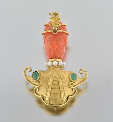 A Nardi Style Carved Coral, Emerald