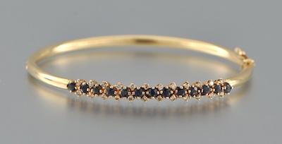 A Gold Bangle Bracelet with Sapphires b477e