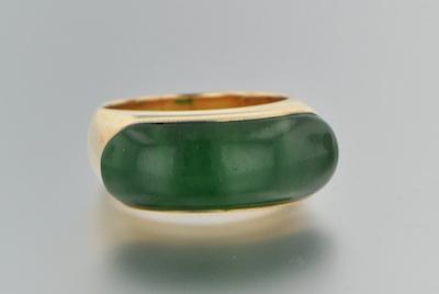 A Jade and Gold Saddle Ring 14k