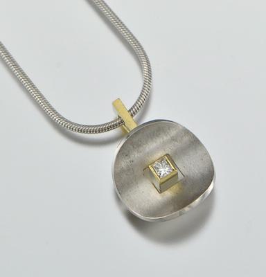 A Platinum and 18k Gold Pendant