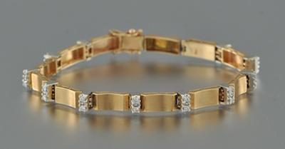 A Ladies' Diamond and Gold Bracelet