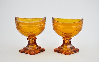 A Pair of Amber Cut Glass Master