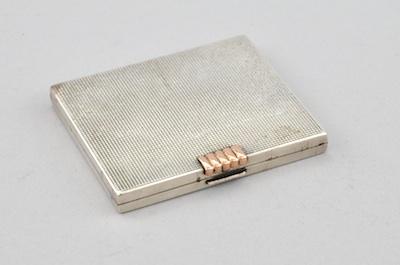 A Swiss Silver Compact With Gold