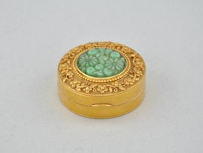 A 22K Yellow Gold and Carved Jade b4e72