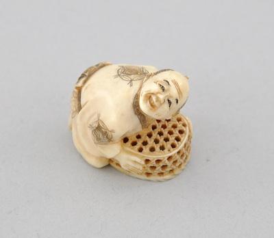 Kneeling Man with a Trap Netsuke