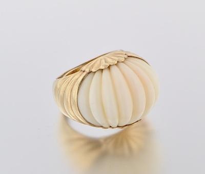 A Carved White Coral and Gold Cocktail