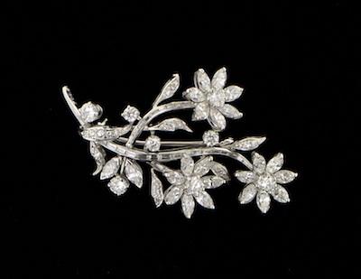 A Platinum and Diamond Flower Brooch