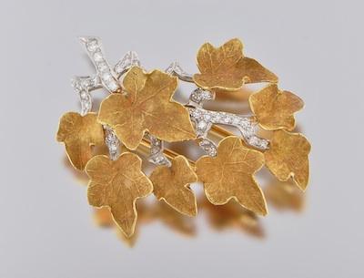 A Platinum, 18k Gold, Diamond Ivy Brooch