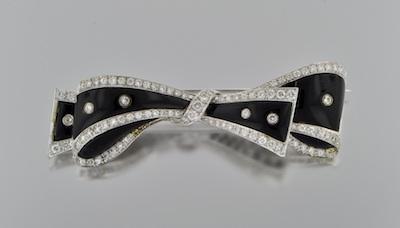 A Black Onyx and Diamond Bow Brooch b4ed9