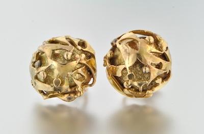 A Pair of 14k Gold Earclips Semi-spheres