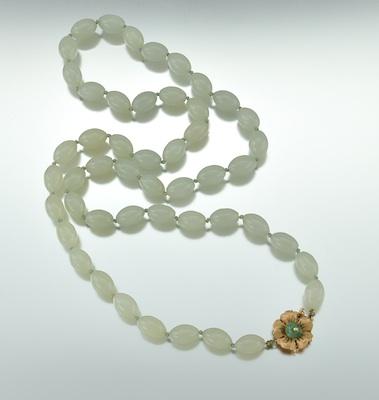 A Carved Stone Bead Necklace with