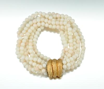 A White Coral and 14k Gold Bracelet