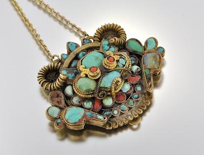 A Silver and Turquoise Pendant on Chain