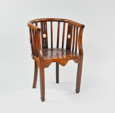 A Chinese Horseshoe Back Armchair